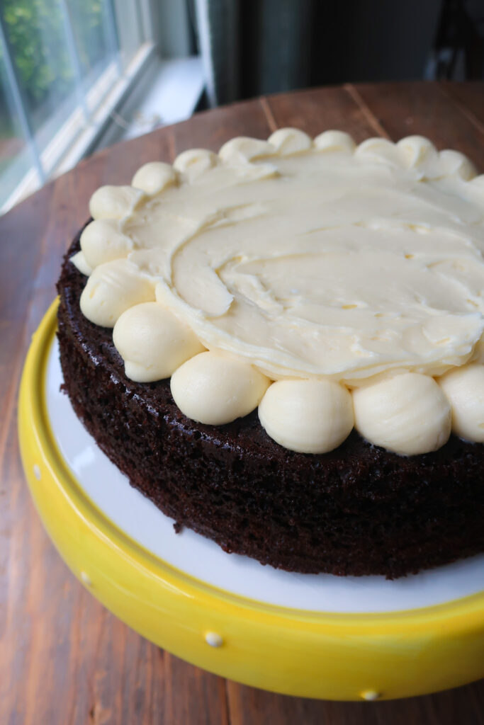 vanilla buttercream on middle layer of cake