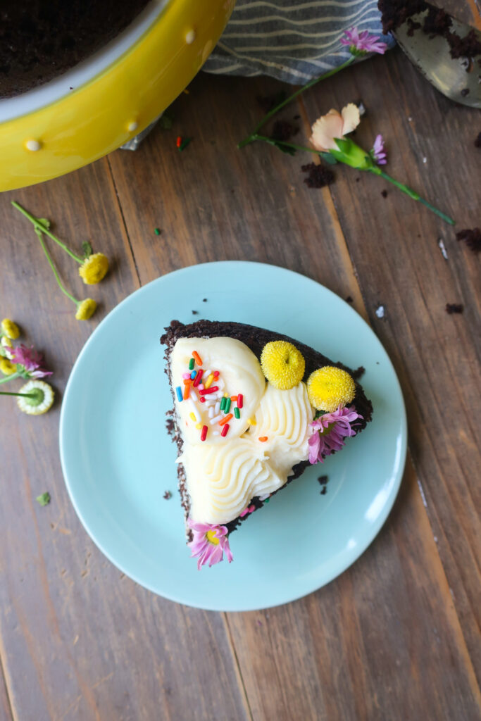 single slice of chocolate cake with vanilla buttercream