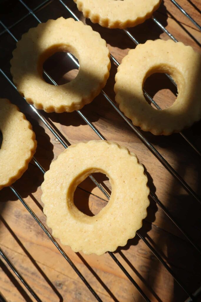 baked classic linzer cookies on wire rack