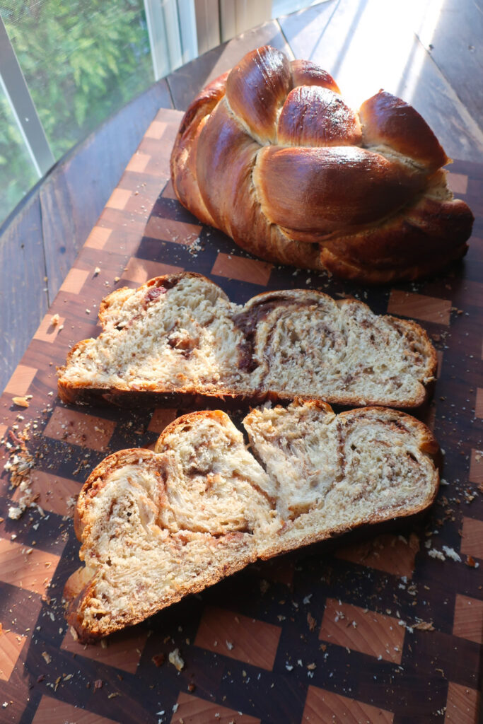 slices of spiced challah bread on cutting board