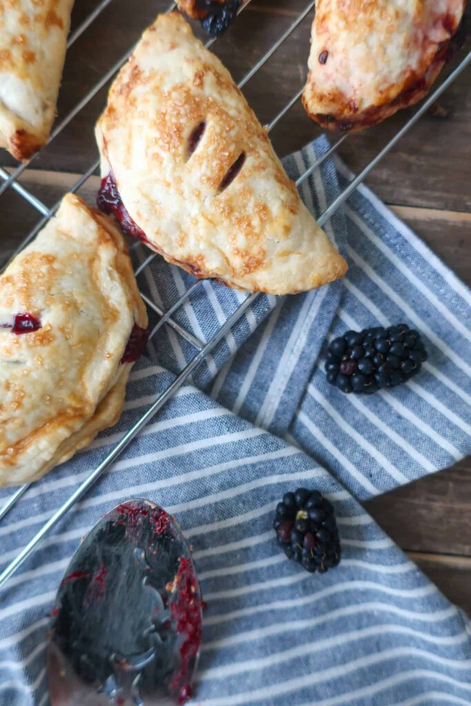 blackberry hand pies made from scratch on wire rack