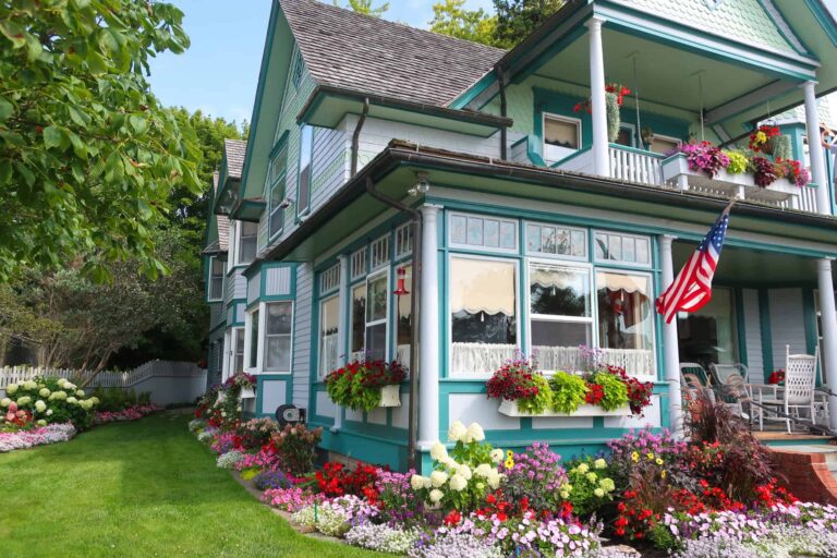 visit these charming Michigan towns like this beautiful home on Mackinac Island
