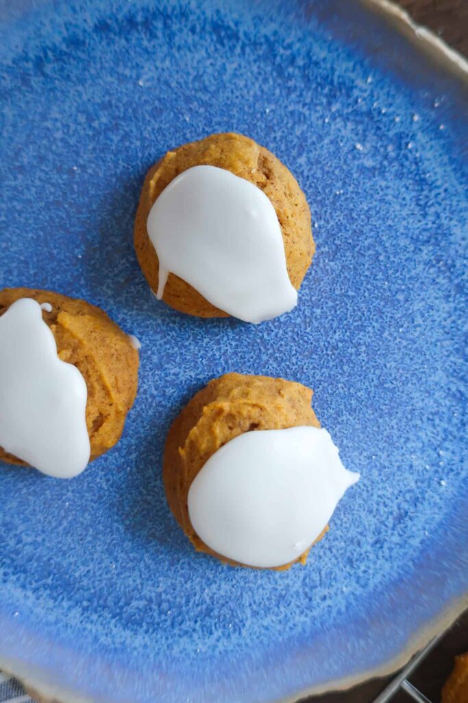 iced fall cookies on blue plate