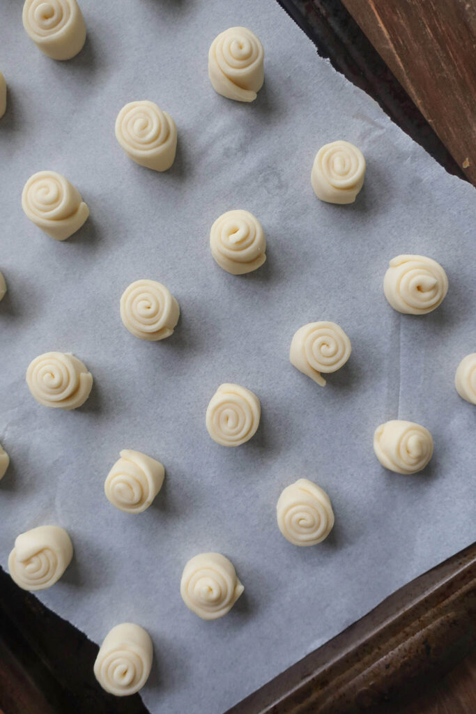 puff pastry rolled on baking sheet