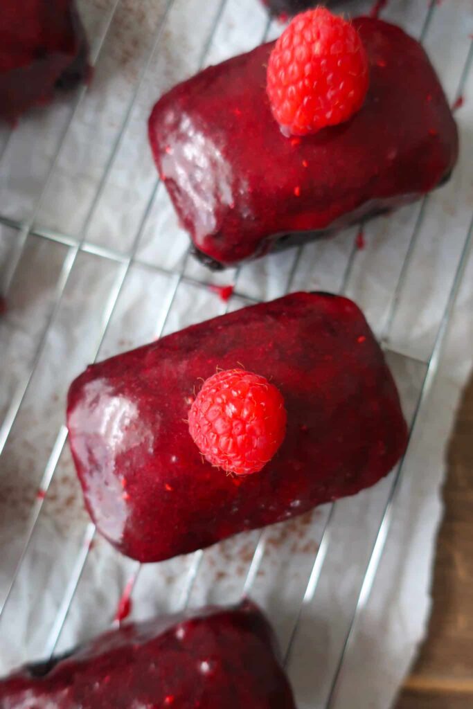 raspberry topped mini cakes