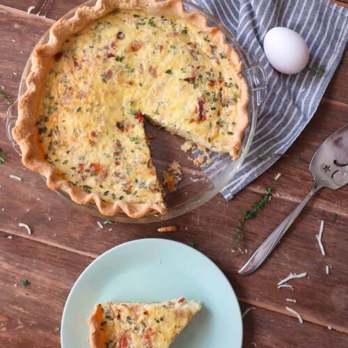 piece of homemade quiche on plate