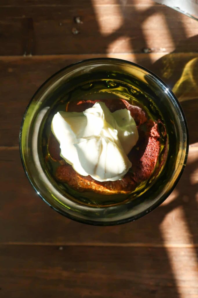 minty whipped cream on top of homemade chocolate lady fingers
