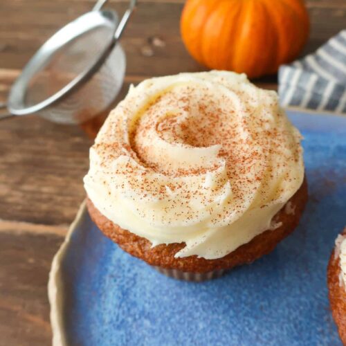 individual pumpkin cupcake with cream cheese frosting