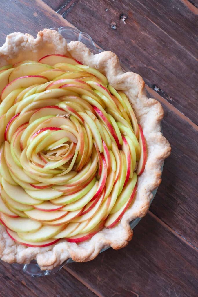 thinly slice apples spiraled into flower