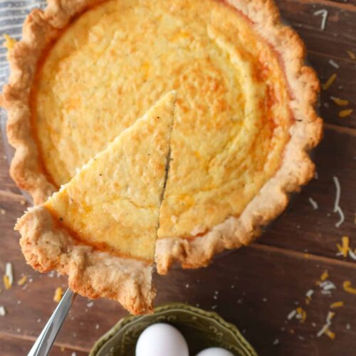 slice of three cheese quiche