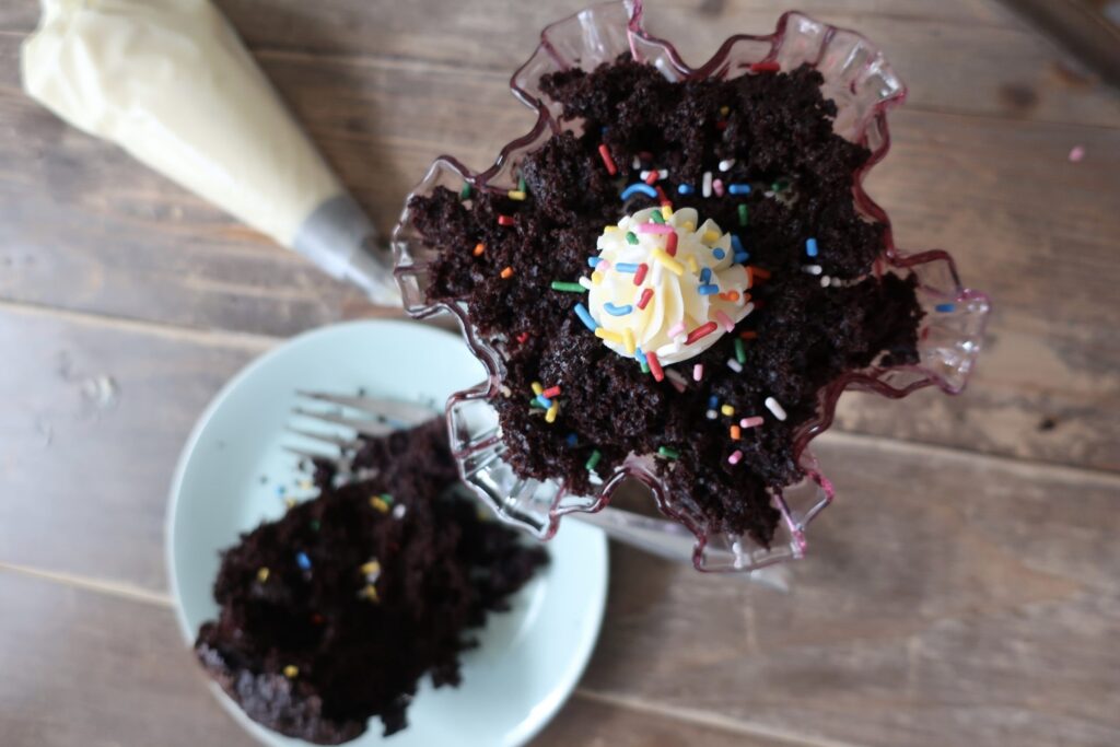 chocolate cake trifle with vanilla buttercream and sprinkles