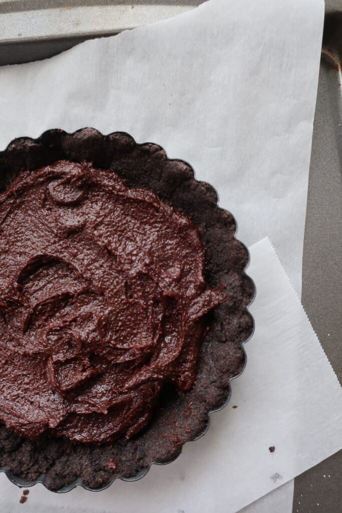 baked oreo crust with brownie batter; triple chocolate brownie pies with oreo crust, double chocolate brownies, and whipped milk chocolate ganache