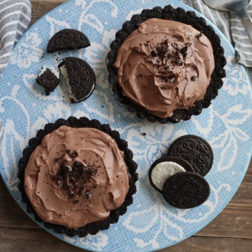 triple chocolate brownie pies with oreo crust, double chocolate brownies, and whipped milk chocolate ganache