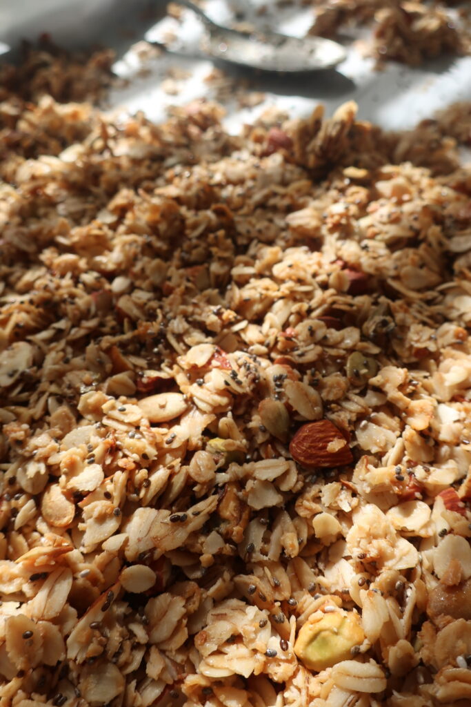 homemade granola; granola with oats, chia seeds, coconut flakes, almonds, pepitas, pistachios