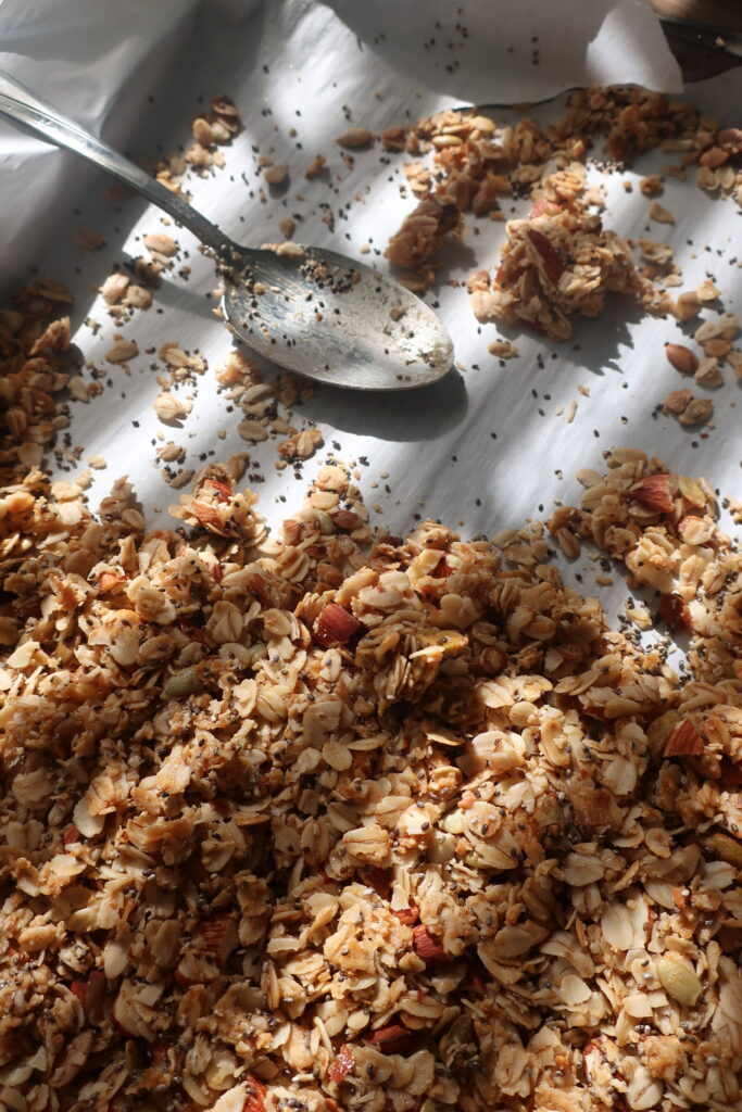 homemade granola; granola with oats, chia seeds, coconut flakes, almonds, pepitas, pistachios