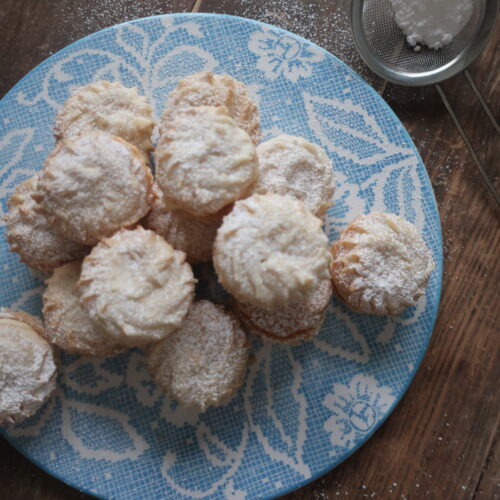 viennese whirl sandwich cookies with passionfruit buttercream