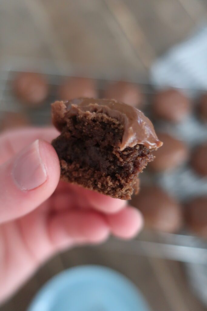 inside look at texas sheet cake cookies; fudgy chocolate frosting; chocolate cookies with chocolate frosting; cake-like cookies