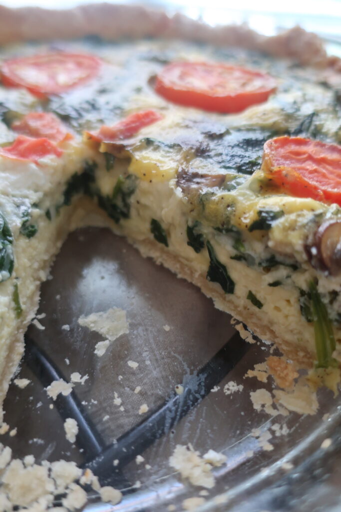 spinach, goat cheese, feta, tomato, spinach quiche in shortcrust pastry