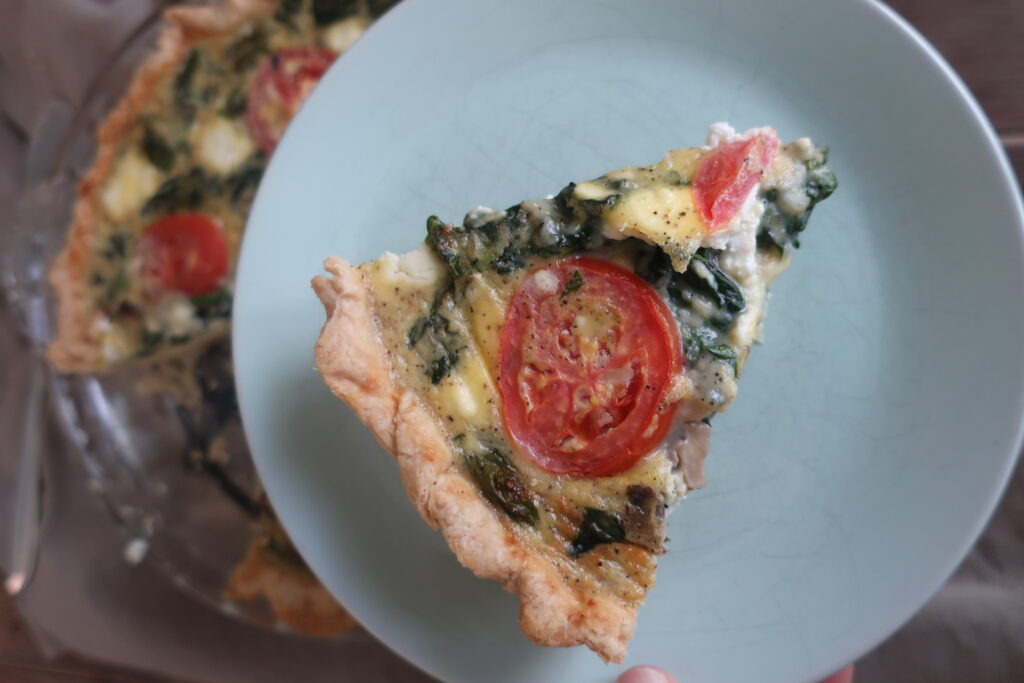 spinach, goat cheese, feta, tomato, spinach quiche in shortcrust pastry