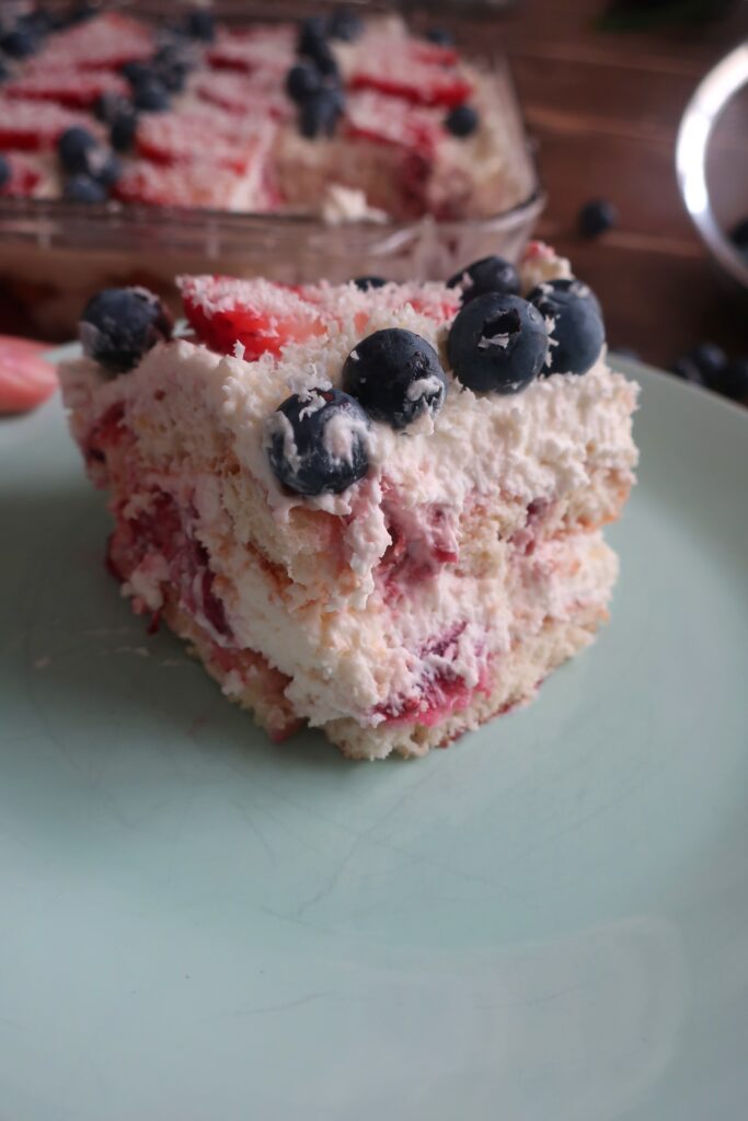 berry tiramisu with blueberries and strawberries, homemade lady fingers dunked in a mixed berry simple syrup, and a whipped marscapone; fourth of july dessert; red, white, and blue dessert; cold dessert