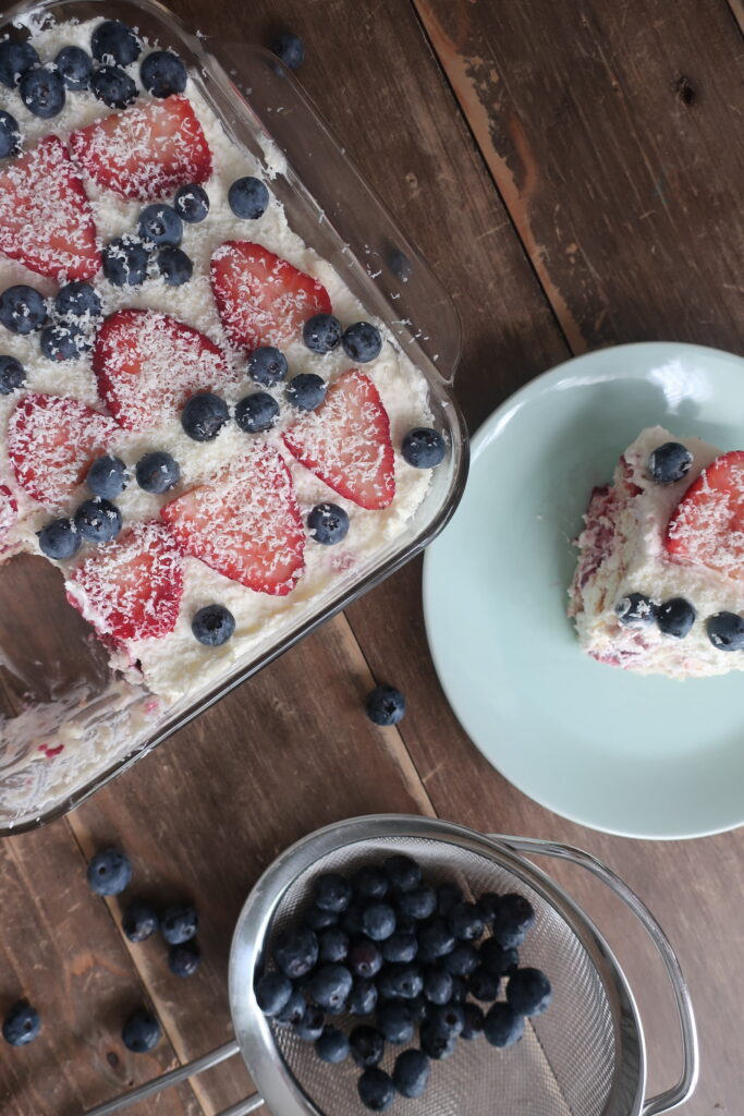 berry tiramisu with blueberries and strawberries, homemade lady fingers dunked in a mixed berry simple syrup, and a whipped marscapone; fourth of july dessert; red, white, and blue dessert; cold dessert