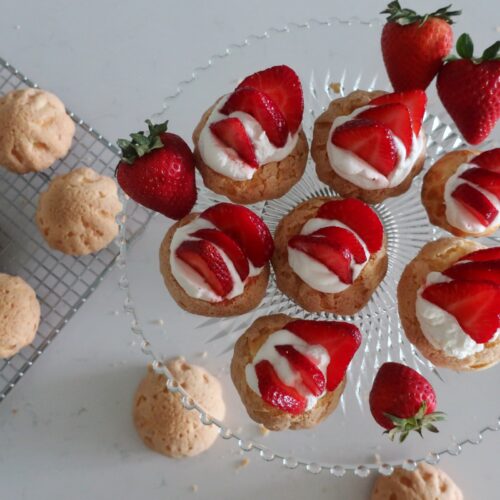 plain choux au craquelin with fresh strawberries and whipped cream