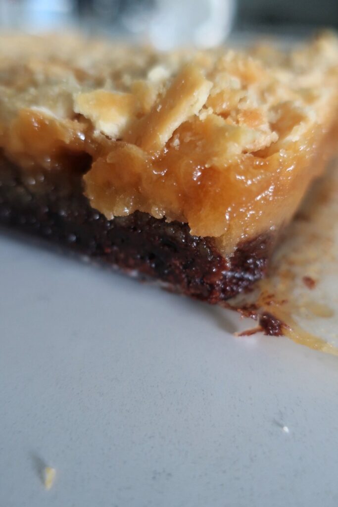 brownies topped with a layer of toffee and a saltine crunch; easy brownie recipes; how to level up your brownie; make your brownies better in 5 minutes