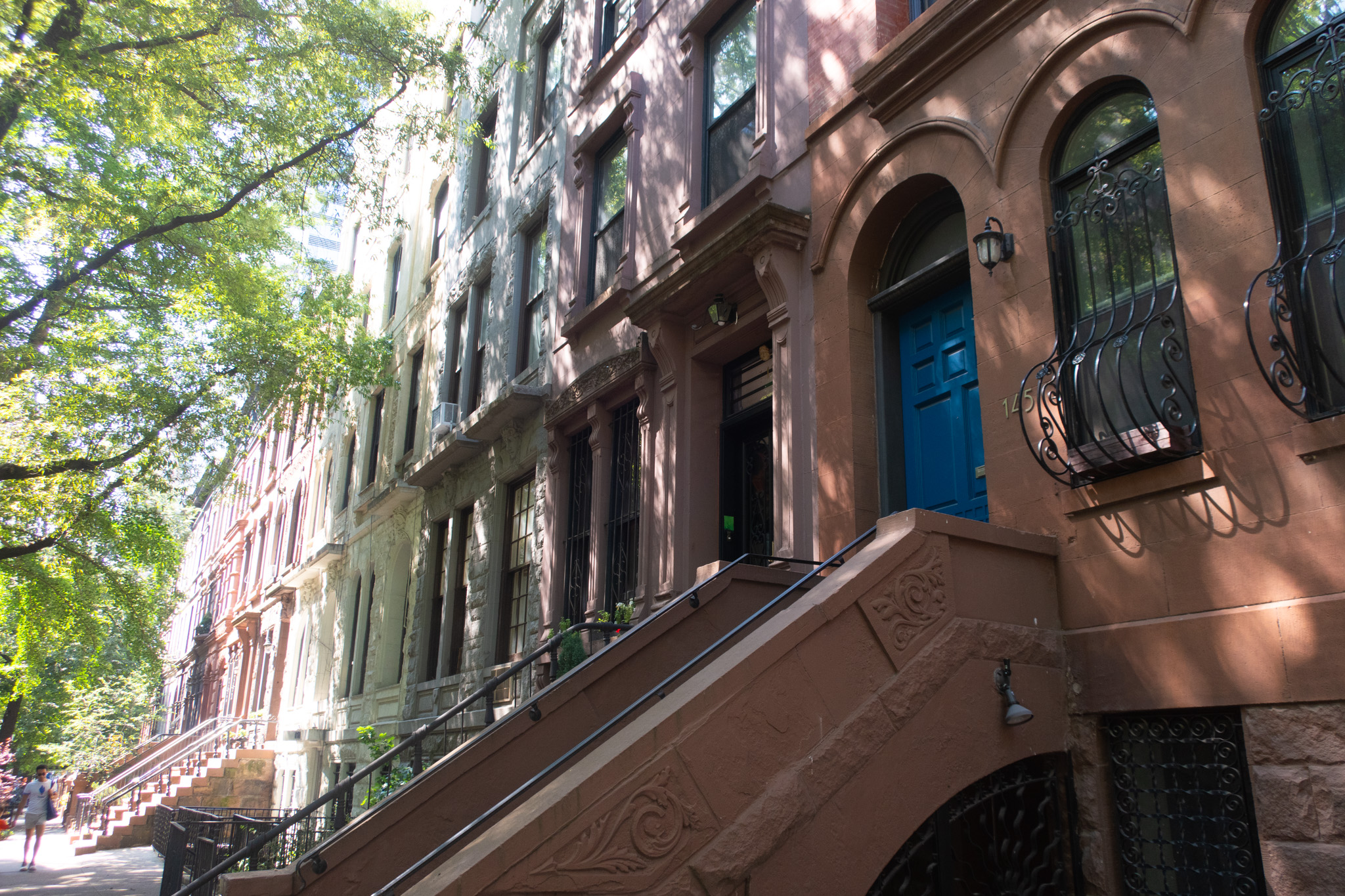 brownstones in upper west side new york city; summer in new york city