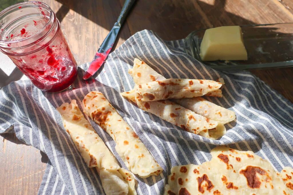 Norwegian lefse served with raspberry jam