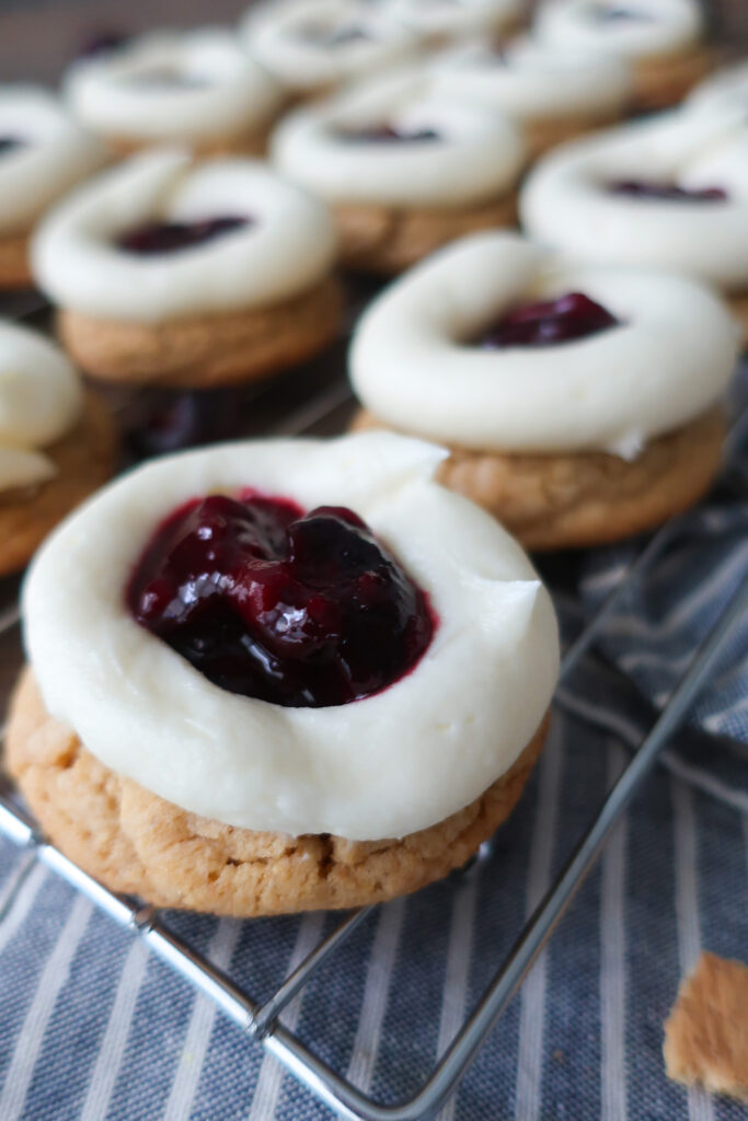 cherry cheesecake cookies; cream cheese frosting; cherry pie filling; graham cracker cookies