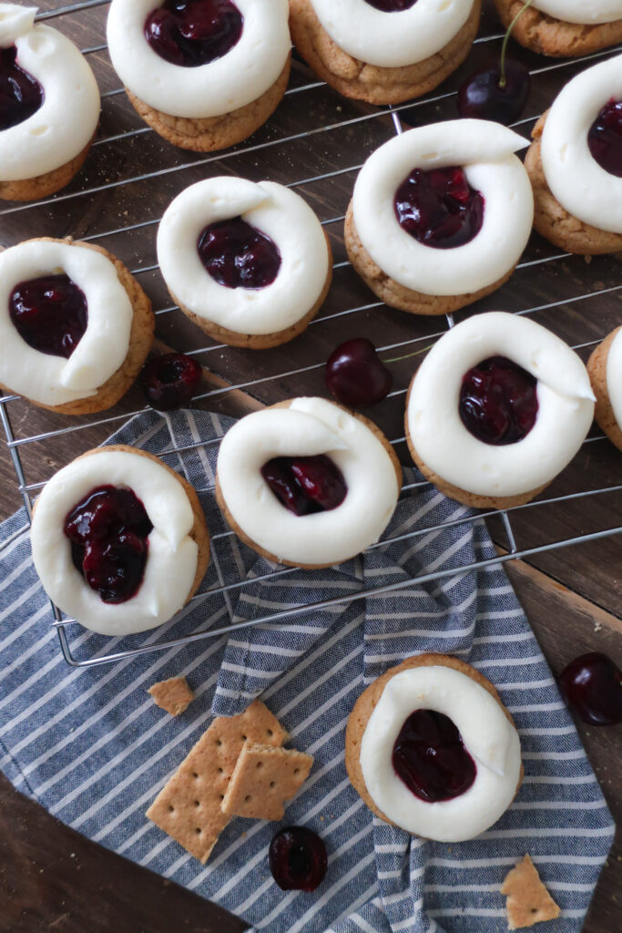 cherry cheesecake cookies; cream cheese frosting; cherry pie filling; graham cracker cookies