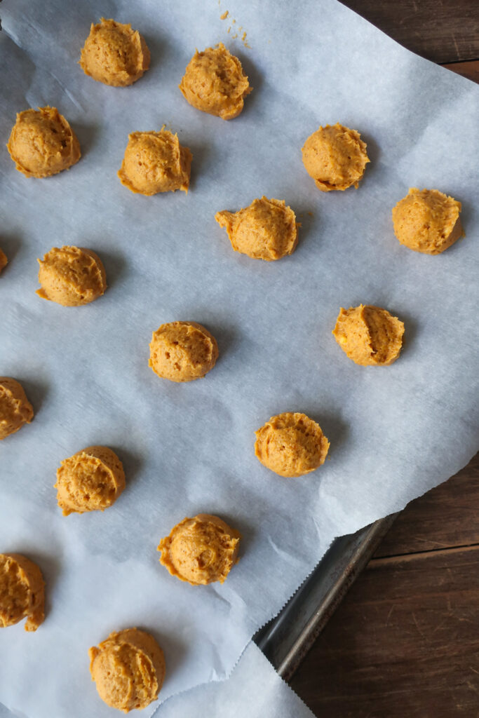 raw scooped grandma's soft pumpkin cookies with simple glaze