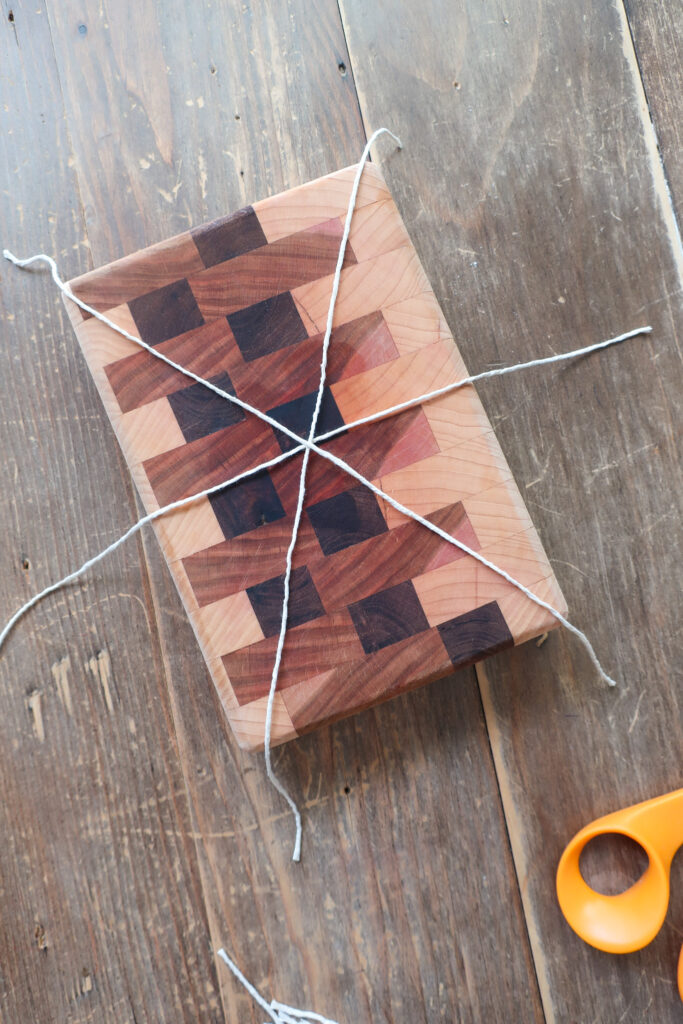 strings for wrapping apple puff pastry shaped like pumpkins with basil leaves for pumpkin stems