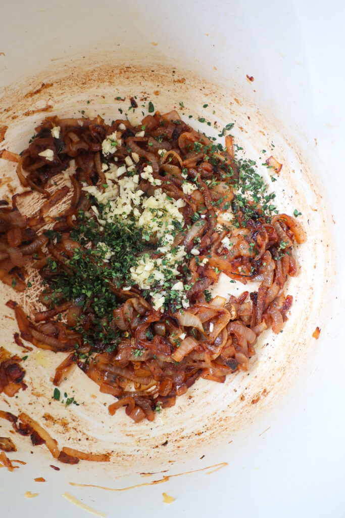 cooked onion with herbs and garlic for French Onion Puff Pastry with Gravy