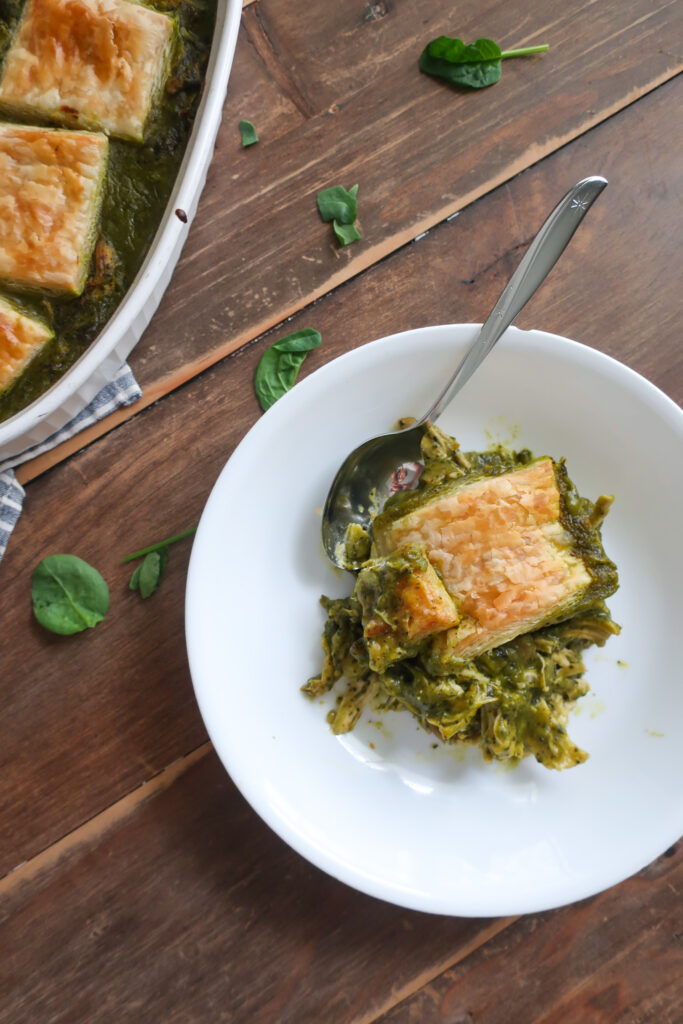 spinach and mushroom chicken pot pie topped with puff pastry