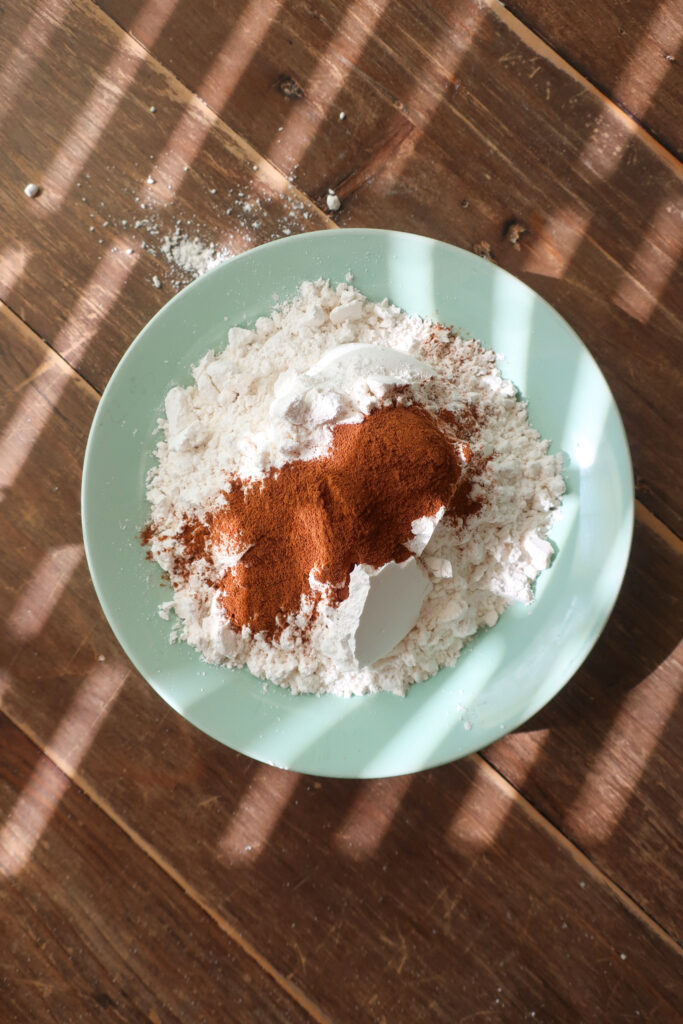 dry ingredients in a bowl for snickerdoodle bars with brown butter cinnamon frosting