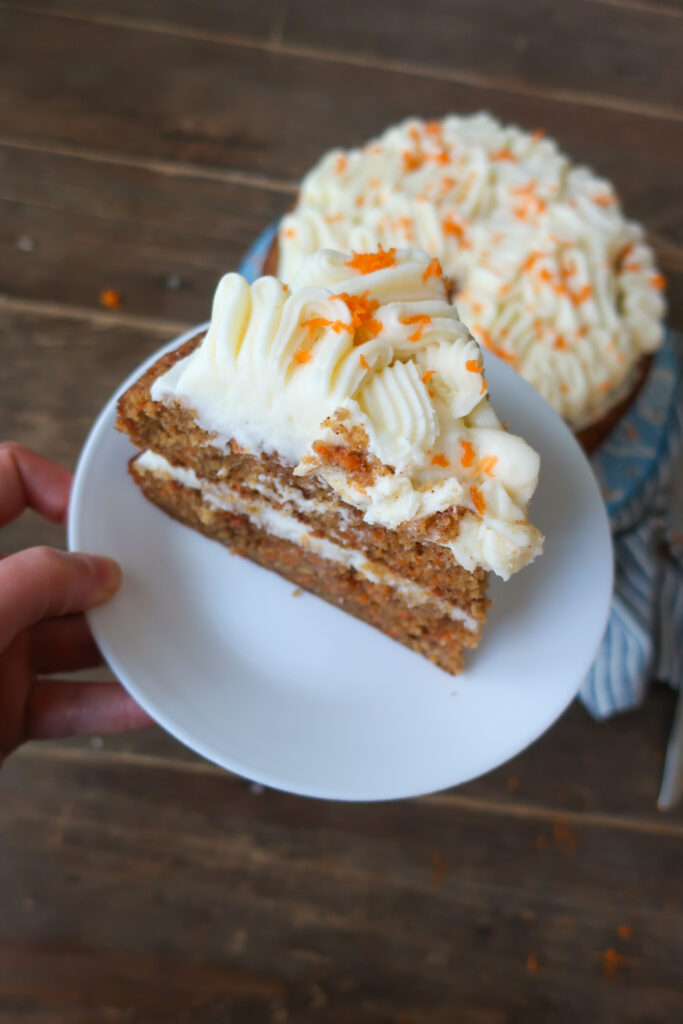 slice of nut and fruit free carrot cake with brown butter cream cheese frosting