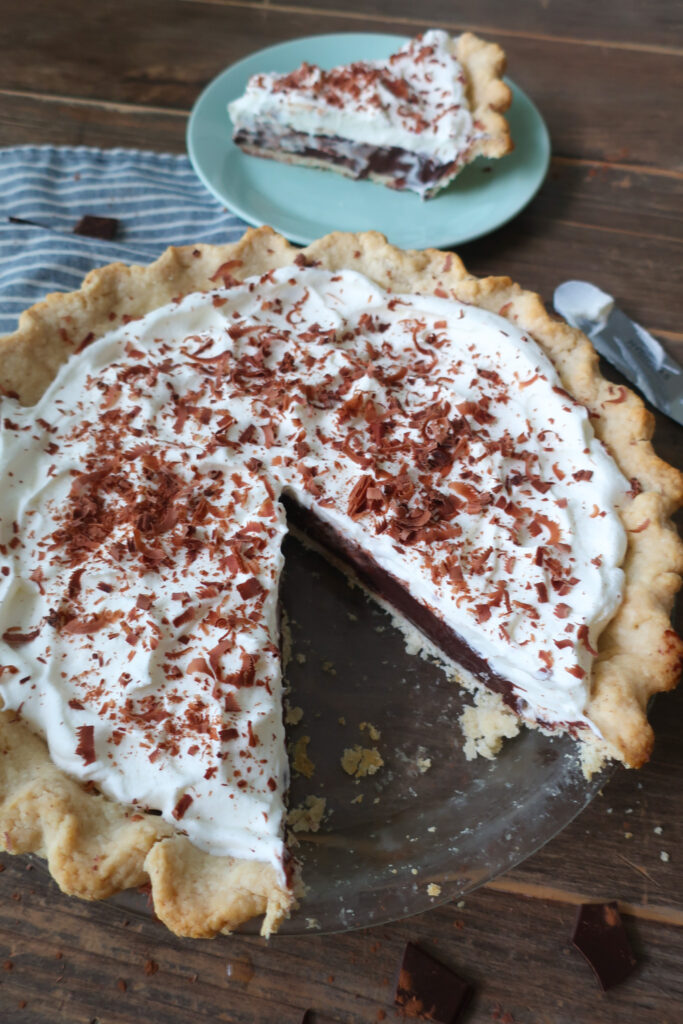 chocolate pudding pie with whipped cream topping