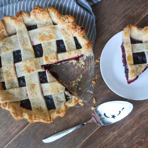 slice of baked cherry pie with lattice crust