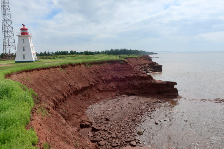 light house on prince edward island in canada; mother daughter trip; canada road trip; red cliffs on prince edward island