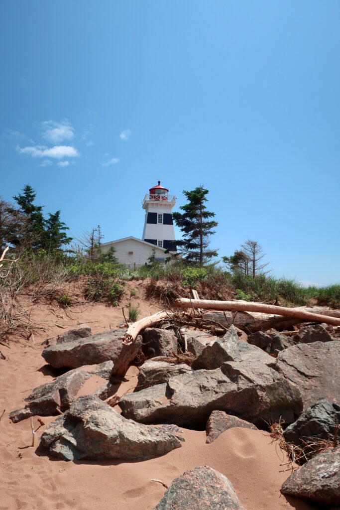 light house on prince edward island in canada; mother daughter trip; canada road trip; red cliffs on prince edward island