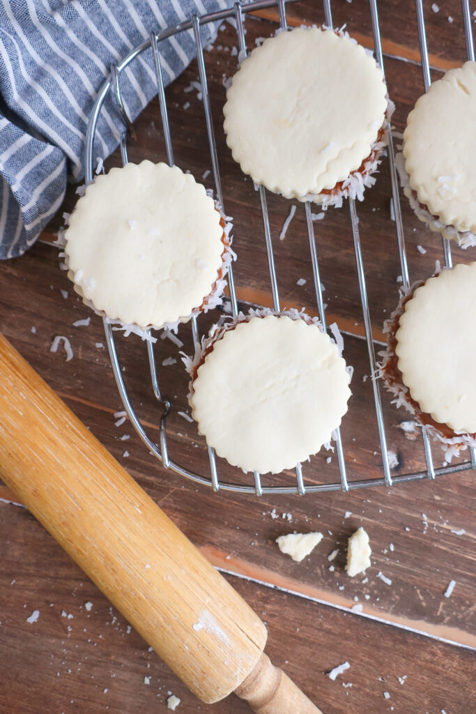 argentinian alfajores; favorite cookies around the world; shortbread dulce de leche cookies with coconut flakes