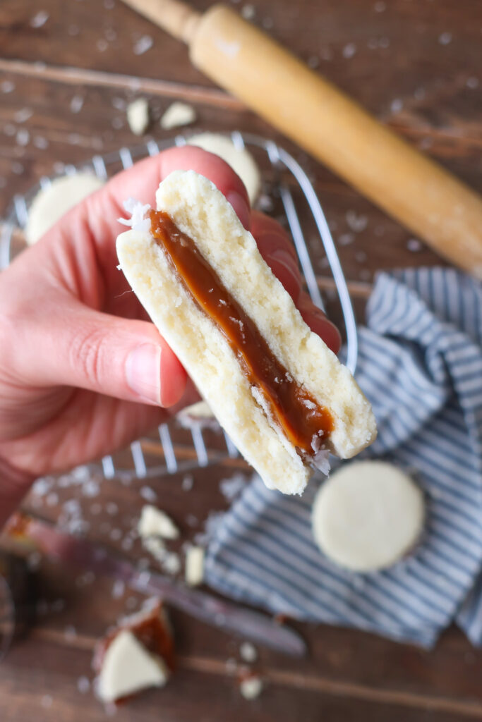 argentinian alfajores; favorite cookies around the world; shortbread dulce de leche cookies with coconut flakes