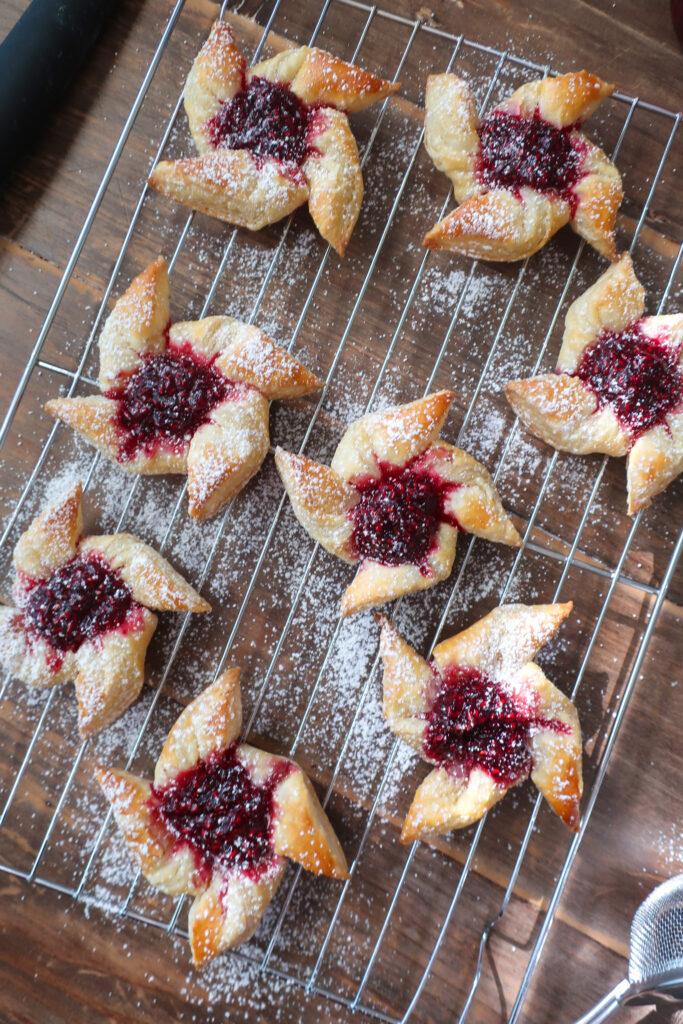 finnish joulutorttu christmas star cookies filled with raspberry jam