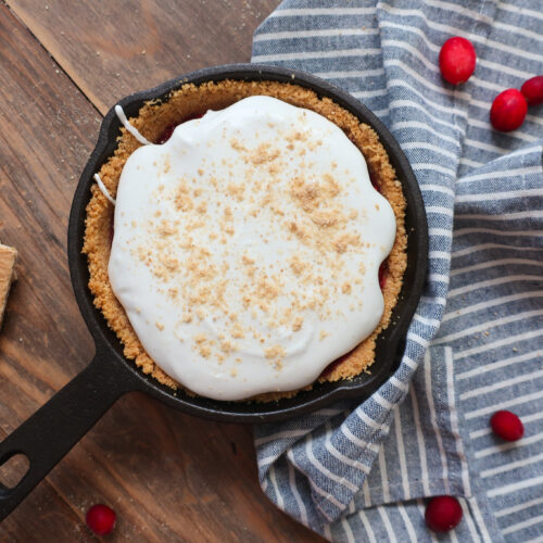 mini graham cracker crust, graham cracker crust in mini cast iron skillet, graham cracker crust for single serve cranberry pie with fresh whipped cream topping, cranberry compote, single serve dessert, single serve pie