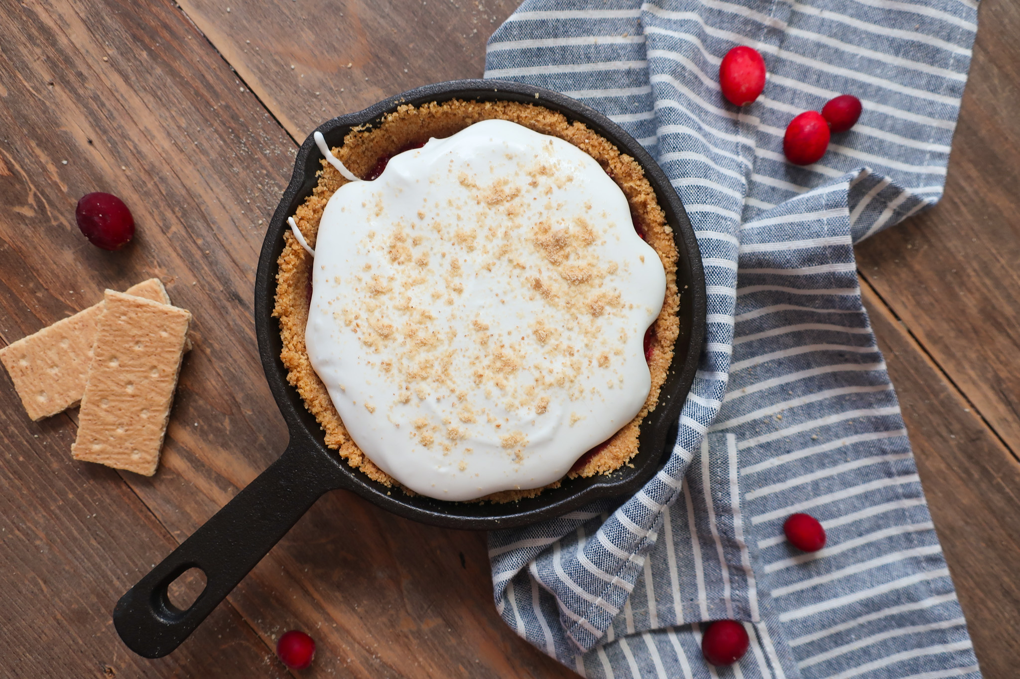 mini graham cracker crust, graham cracker crust in mini cast iron skillet, graham cracker crust for single serve cranberry pie with fresh whipped cream topping, cranberry compote, single serve dessert, single serve pie