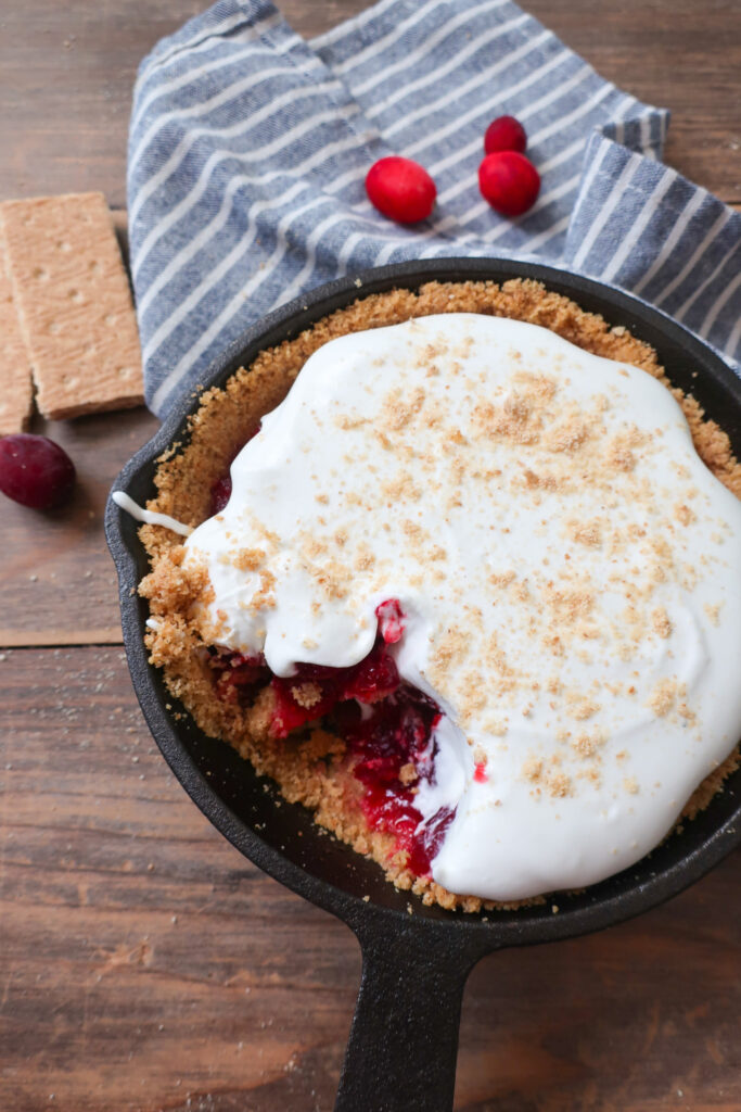 mini graham cracker crust, graham cracker crust in mini cast iron skillet, graham cracker crust for single serve cranberry pie with fresh whipped cream topping, cranberry compote, single serve dessert, single serve pie