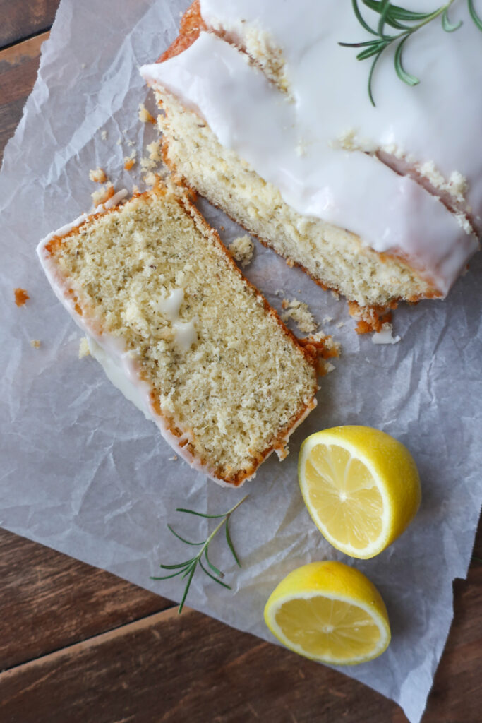 lemon rosemary loaf cake with lemon rosemary simple syrup and lemon glaze