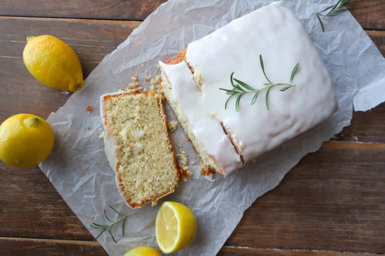 lemon rosemary loaf cake with lemon rosemary simple syrup and lemon glaze