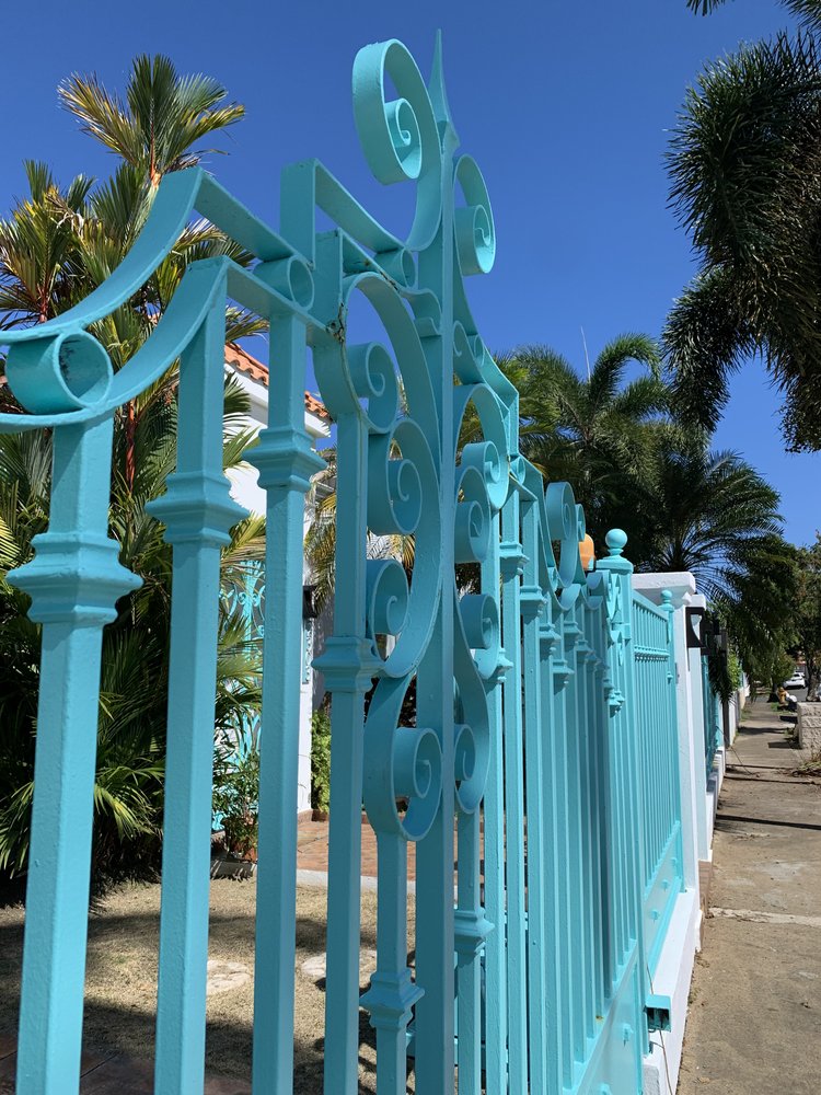 blue house gate puerto rico, usa, north america; friend trip; puerto rico in february; puerto rico itinerary; san juan puerto rico; women who travel; female travel; long week trip inspiration